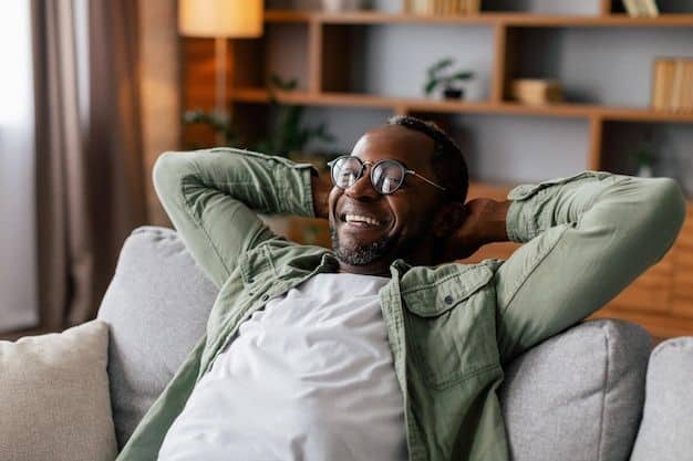 Premium Photo Satisfied adult african american man in glasses and casual resting and relaxing enjoy comfort peace and free time